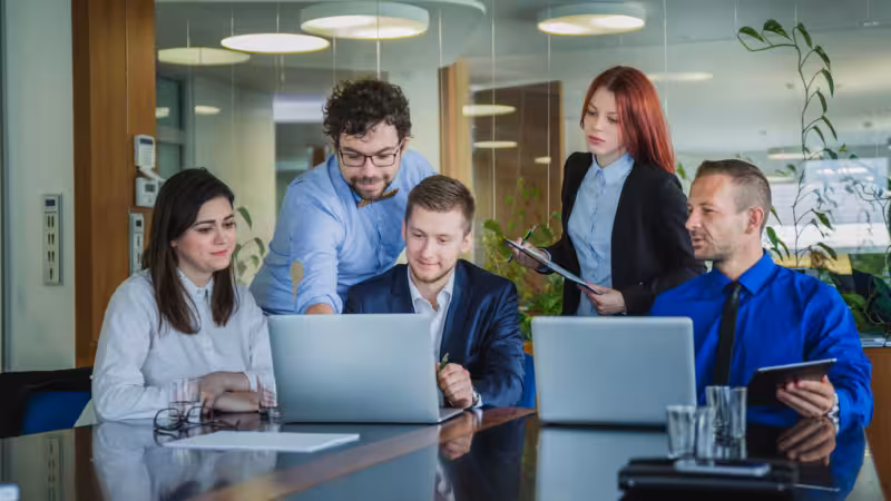 creative-people-working-office_23-2147656715